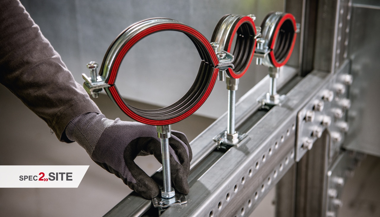 a close up of modular support components for piping applications